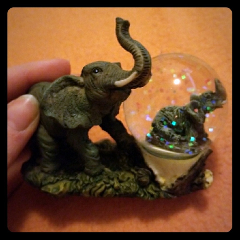 Miniature snow globe with elephant stand
